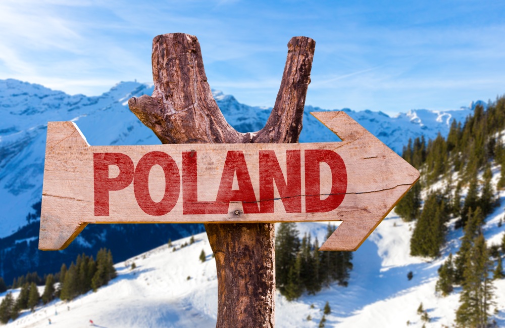 Poland wooden sign with winter background